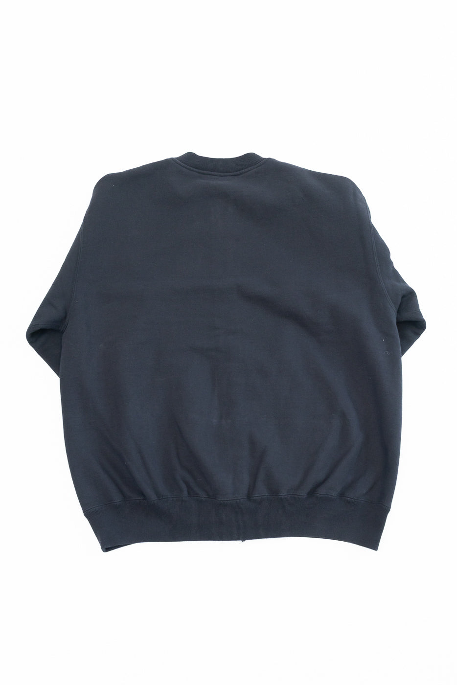 Back view flat lay of a navy blue crewneck sweatshirt.
