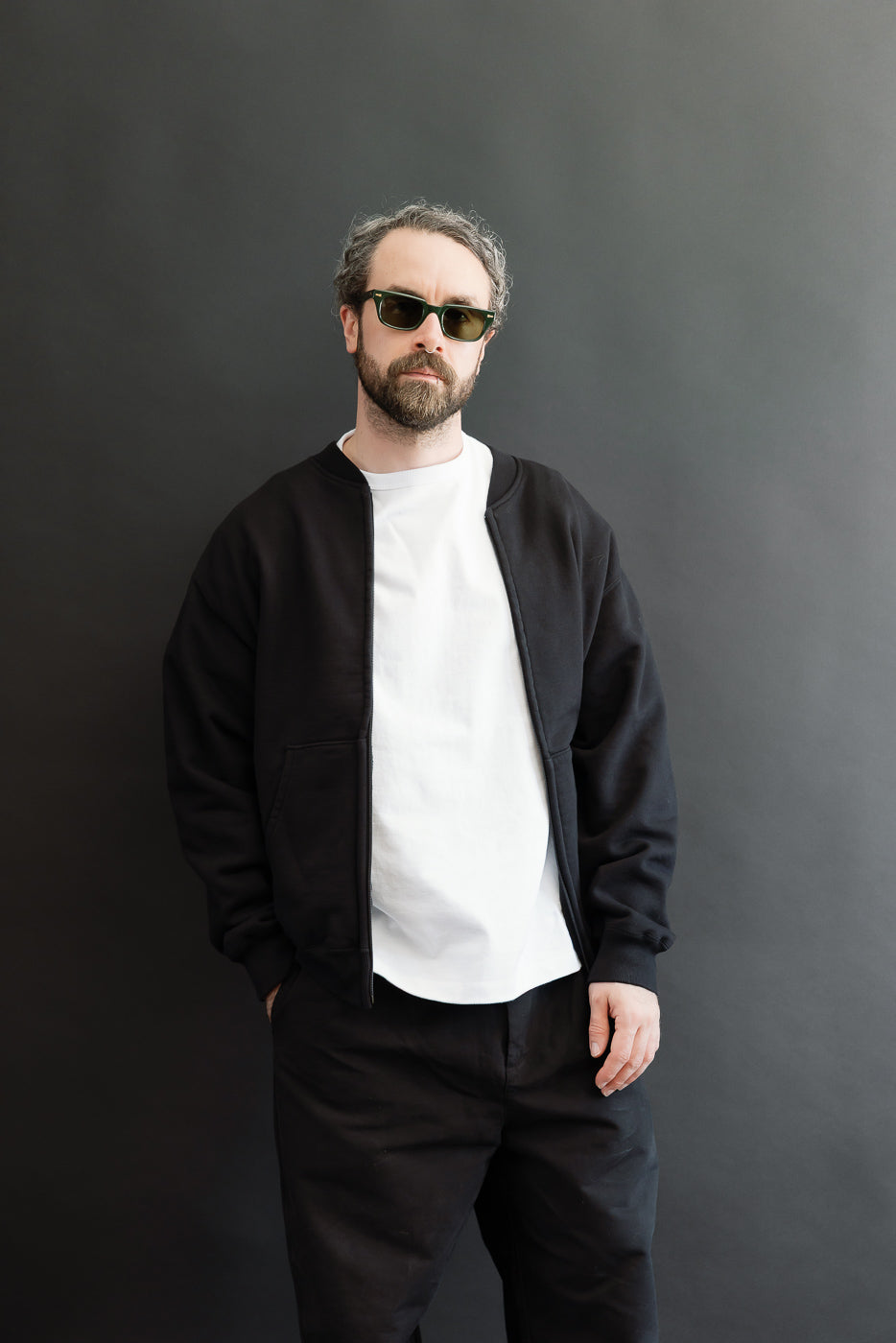 Full body front view of a male model, 5'9