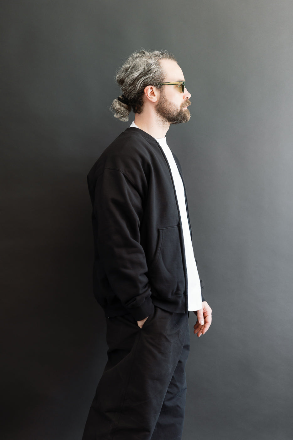 Side profile, full body view of a male model, 5'9