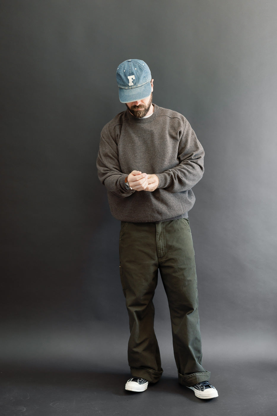 Full body front view of a male model, 5'9