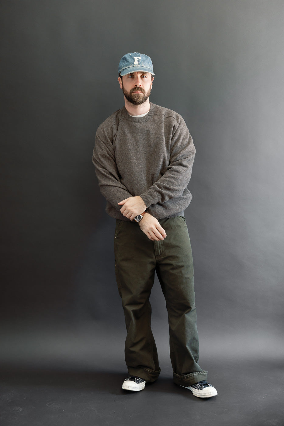 Full body front view of a male model, 5'9