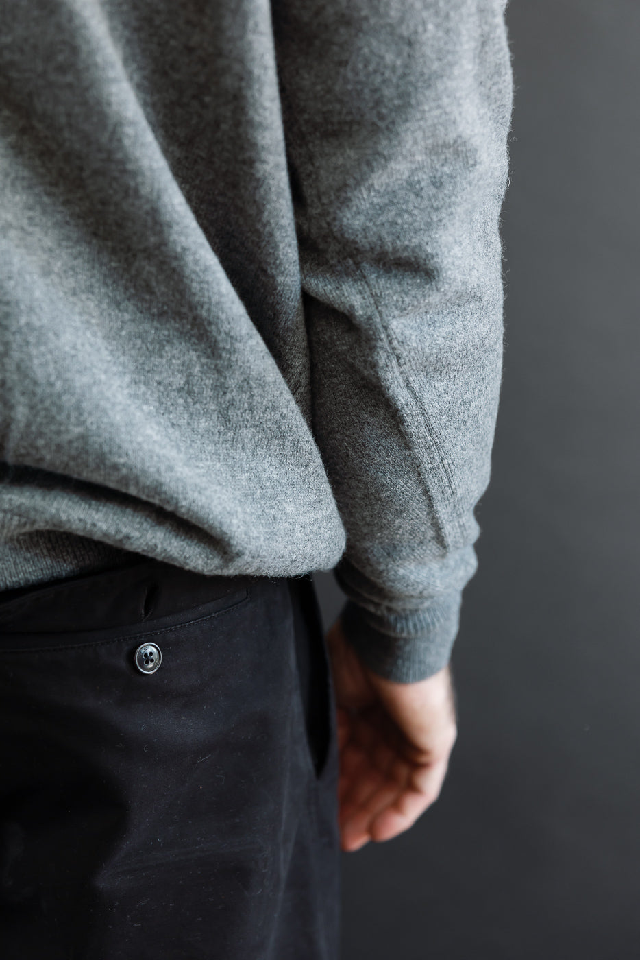 Close-up side view of a male model (5'9