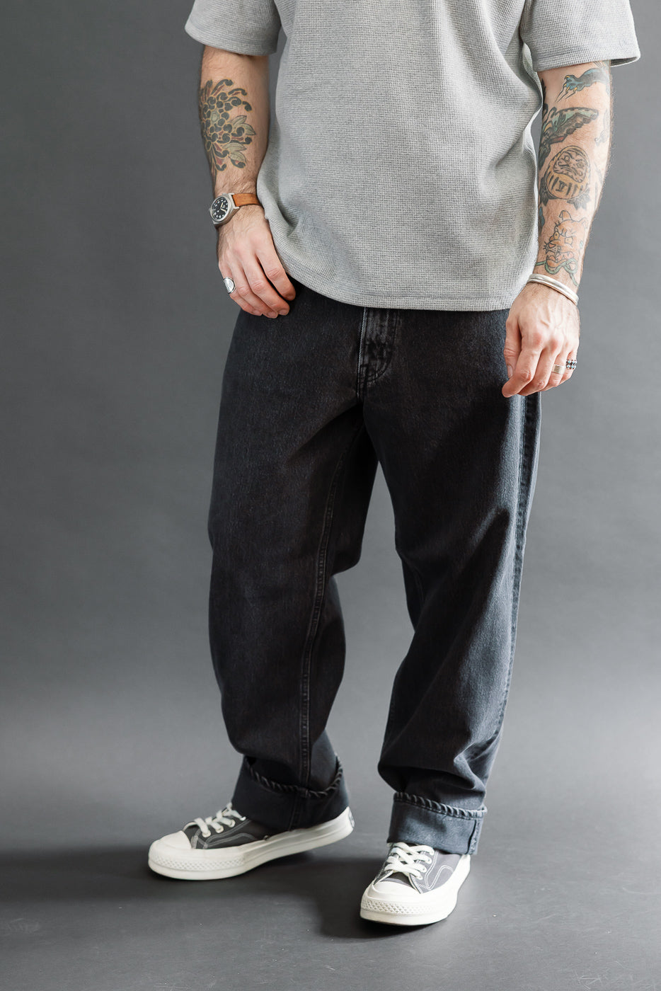 Full body front view of a male model, 5'9