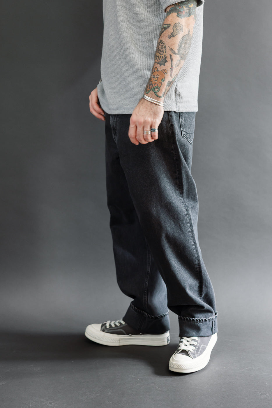 Full body side view of a male model, 5'9