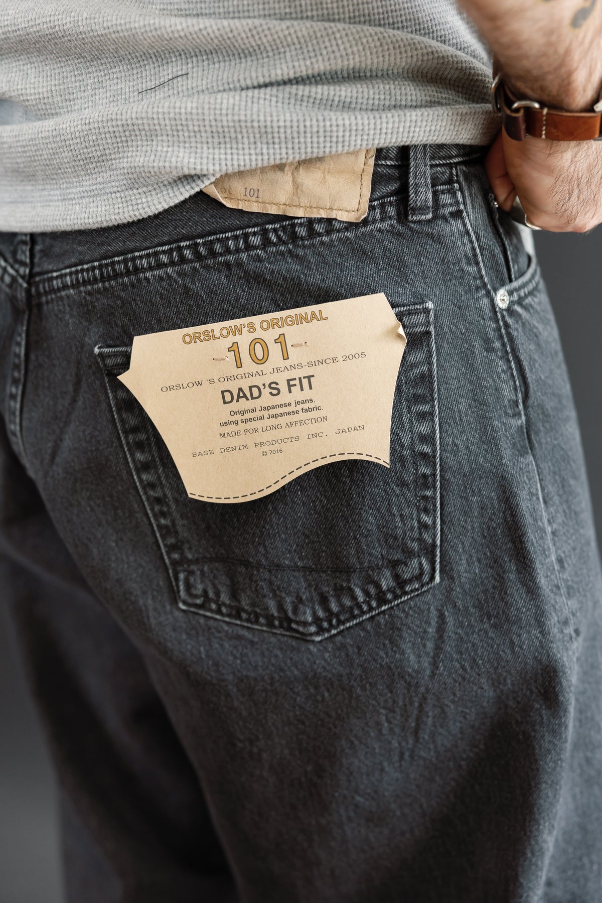Close-up of back right pocket of Orslow 101 Dad's Fit jeans on male model, 5'9