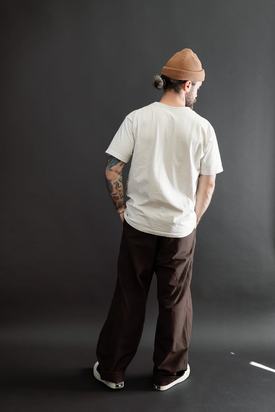 Full body back view of a male model, 5'9