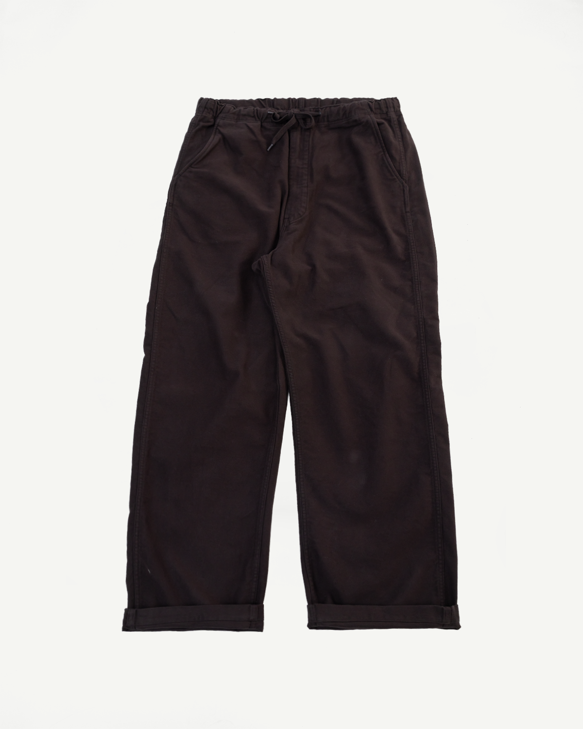 Front view flat lay of dark brown wide-leg drawstring trousers with cuffed hems.