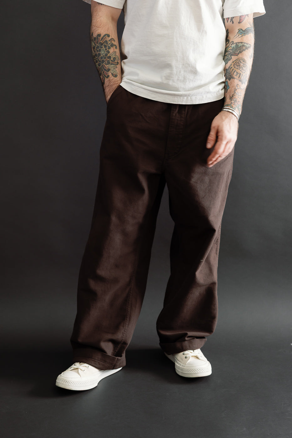 Full body front view of a male model, 5'9