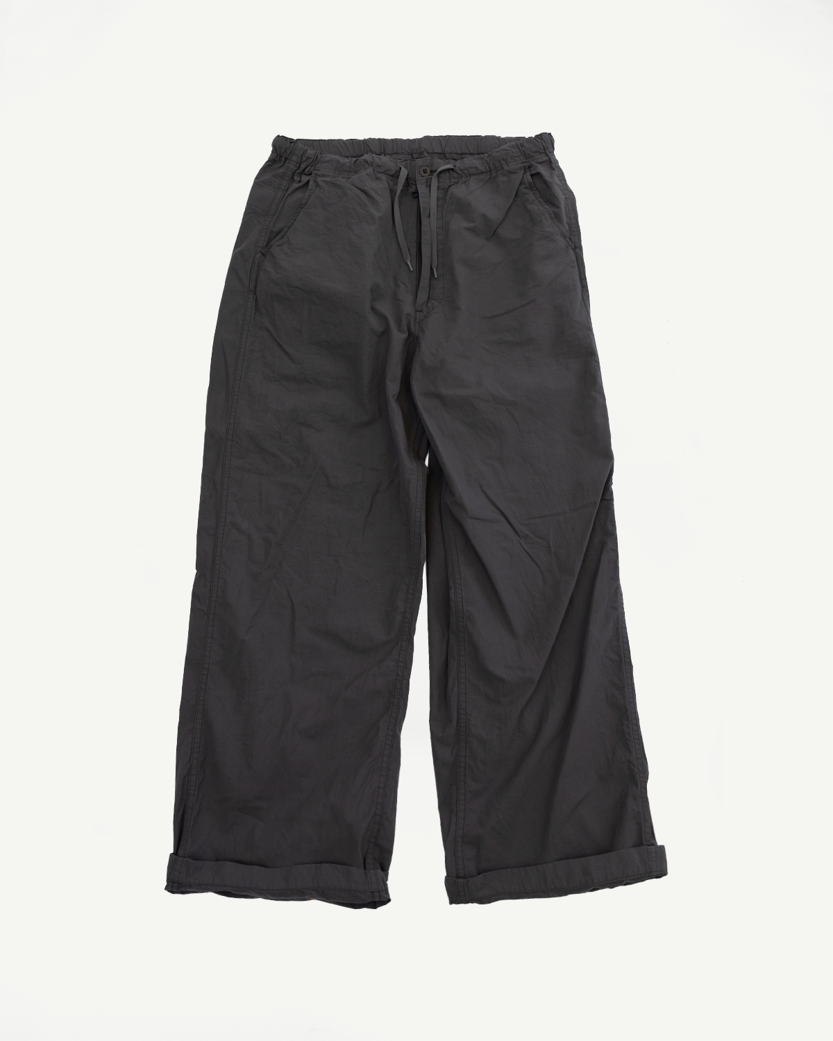 Flat lay front view of dark gray wide-leg drawstring pants with cuffed hems and elastic waist