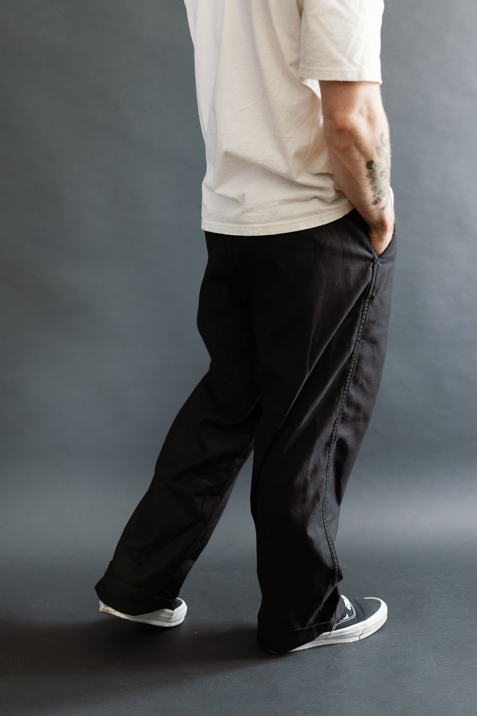 Side view, full body of male model 5'9