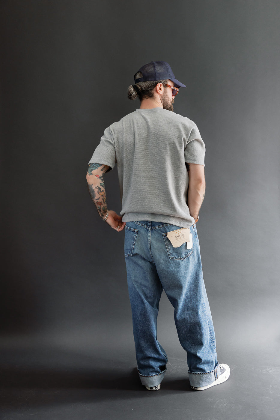 Full body back view of male model, 5'9