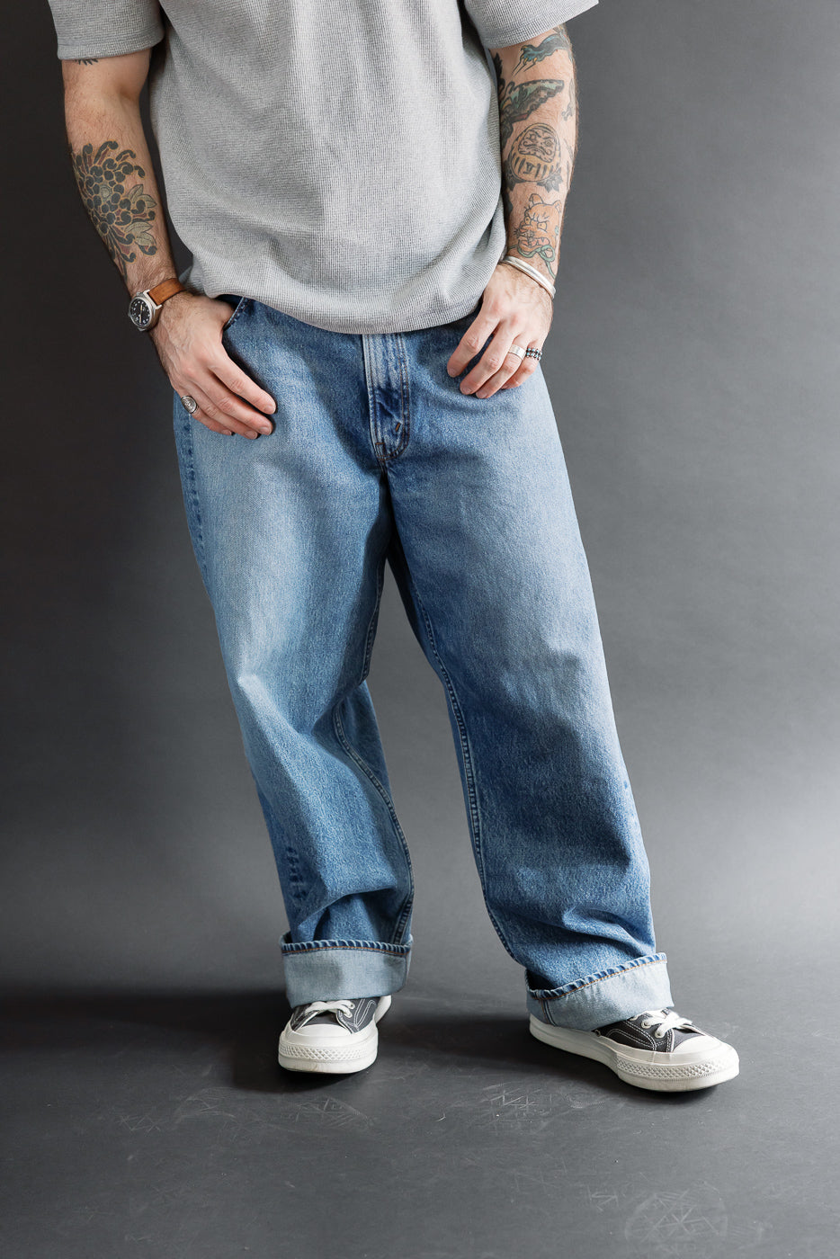 Full body front view of a male model, 5'9