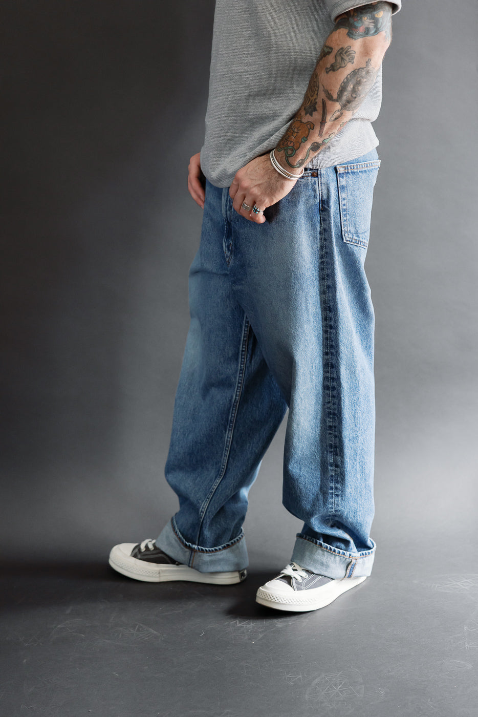 Full body front view of a male model, 5'9