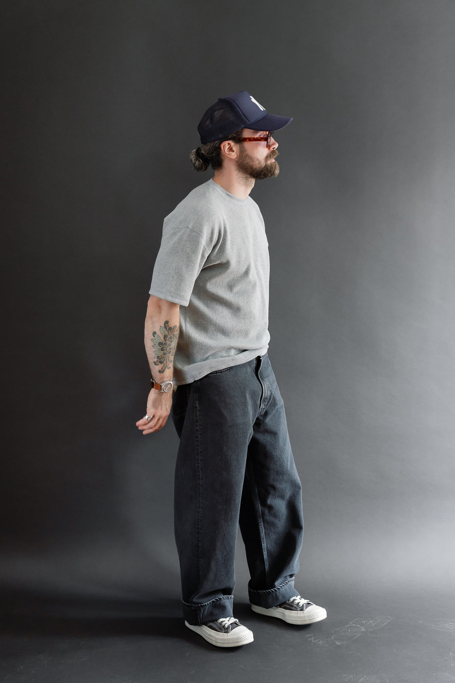Full body side view of male model (5'9