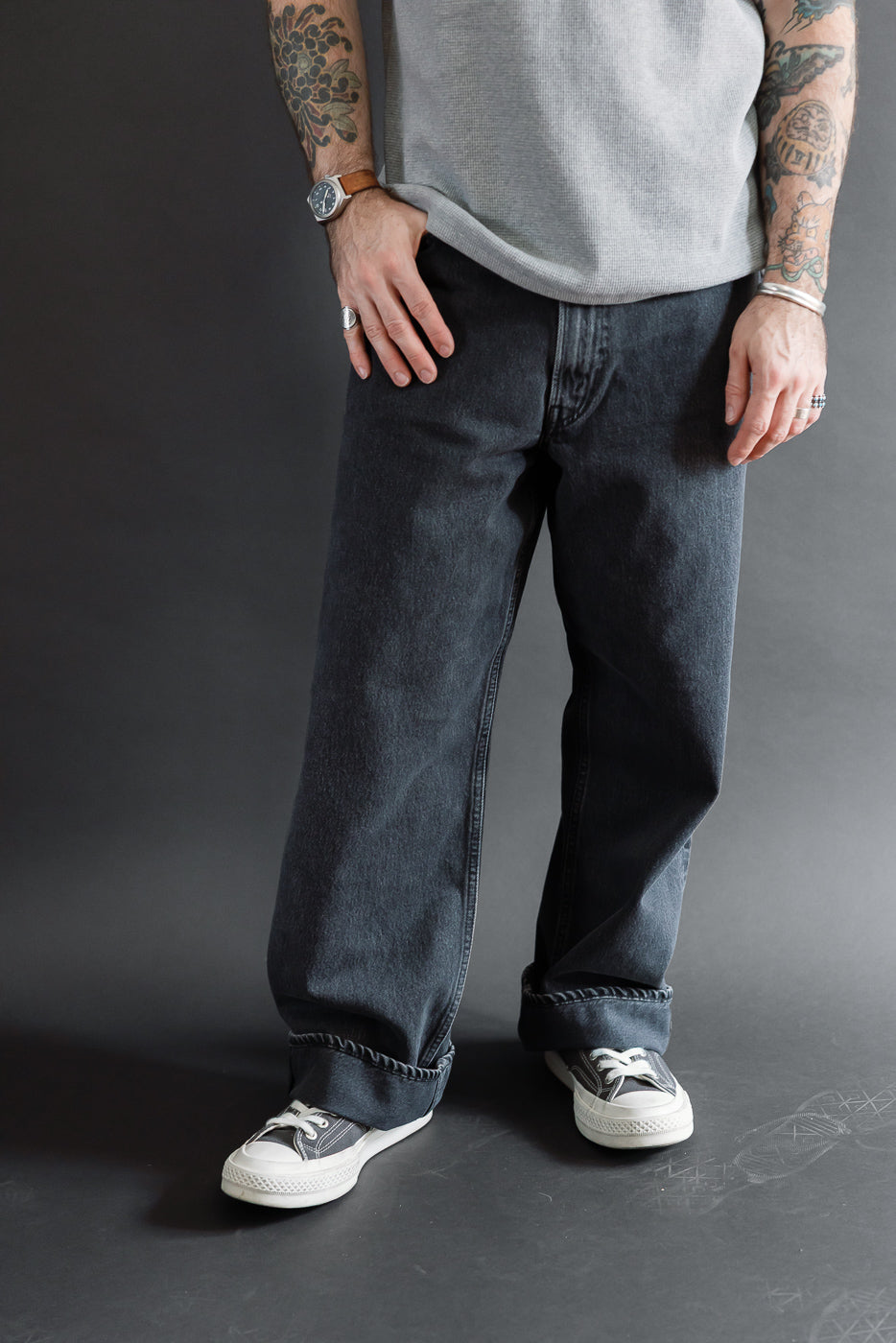 Full body front view of a male model, 5'9