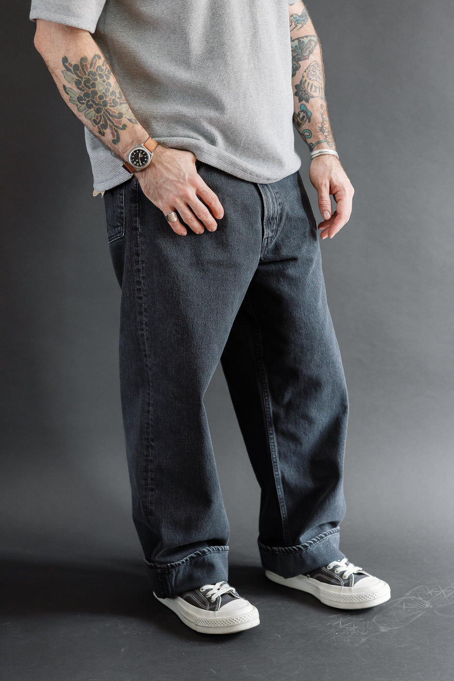 Full body front view of a male model, 5'9