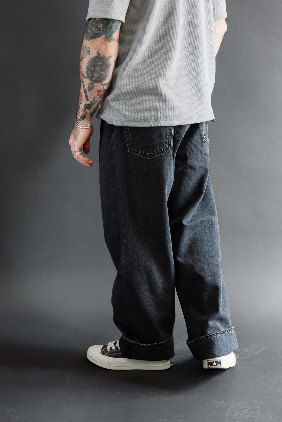 Full body rear view of a male model (5'9