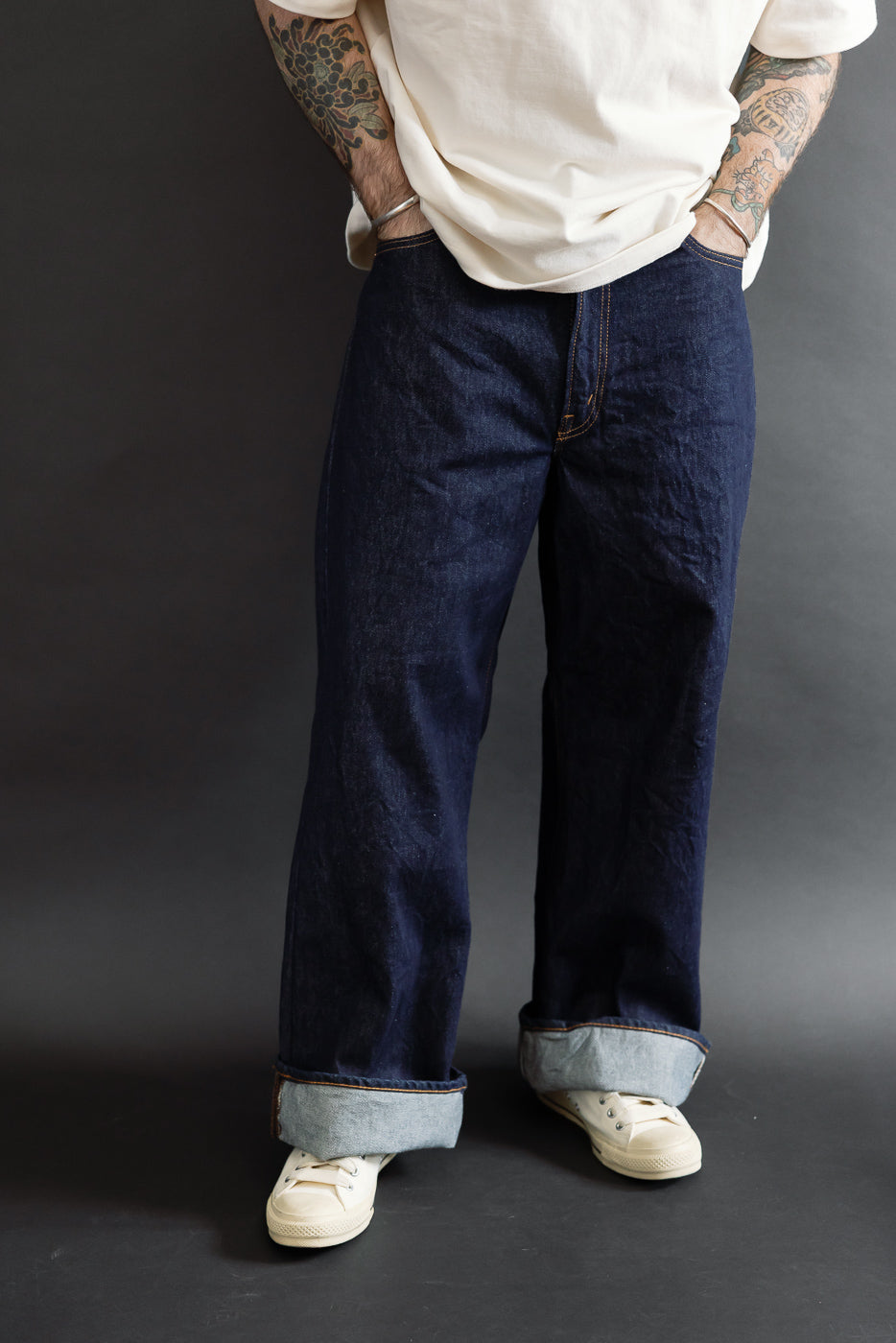 Full body front view of a male model, 5'9