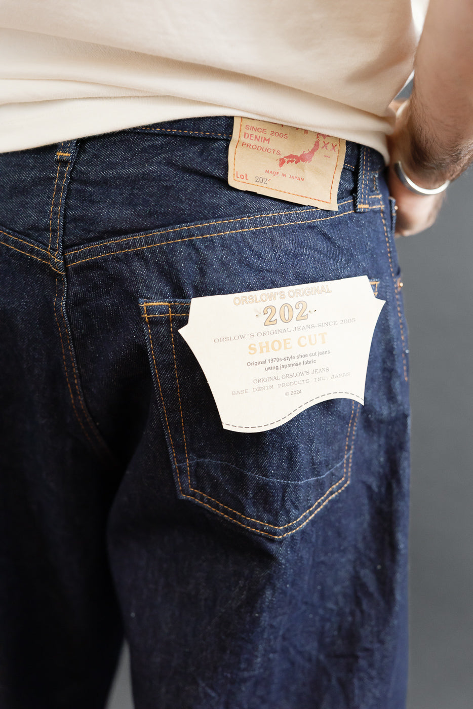 Close-up of the back pocket of Orslow's original 202, shoe cut selvedge denim jeans.