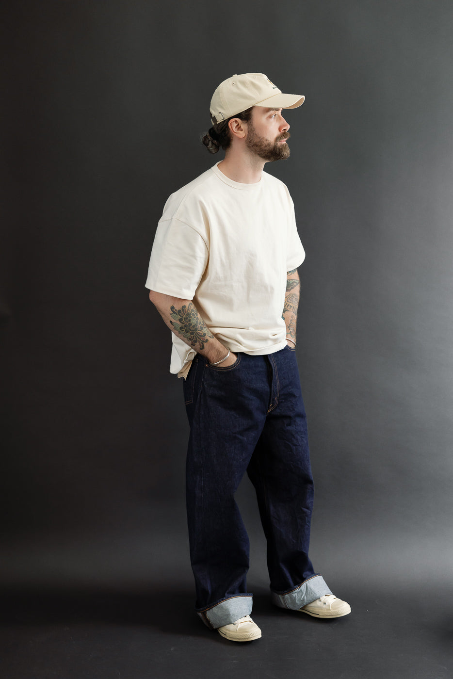 Full body profile view of a male model, 5'9