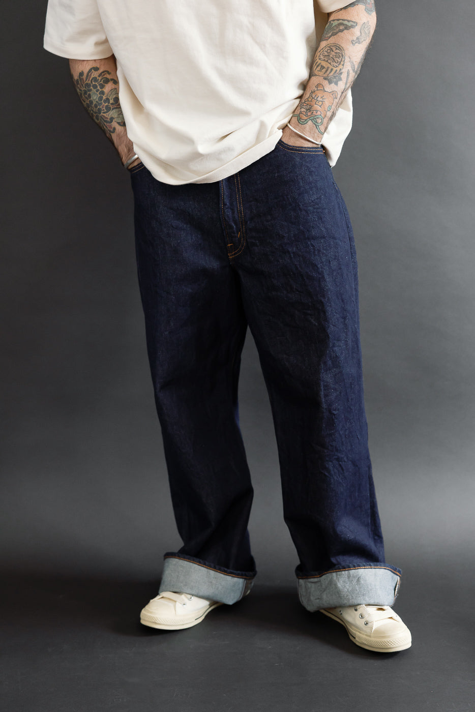 Full body front view of a male model, 5'9