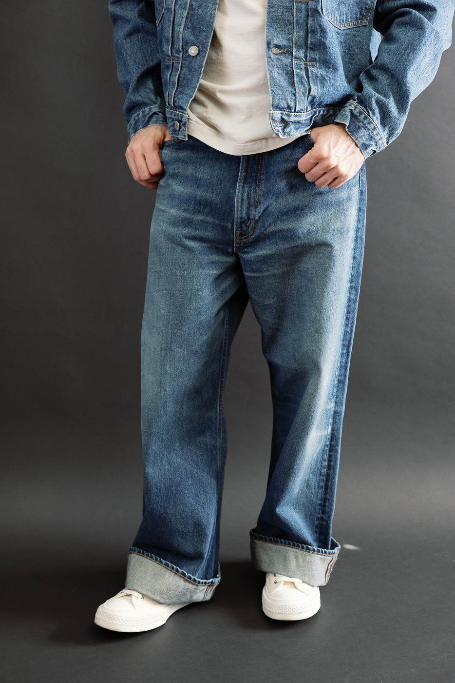 Front full body view of a male model, 5'9