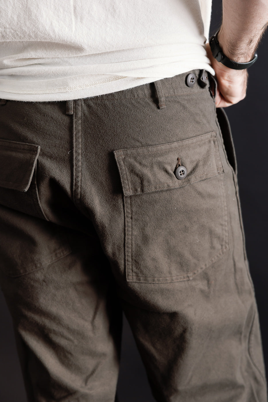 Close-up back view of OrSlow coffee brown fatigue pants on male model, 5'9