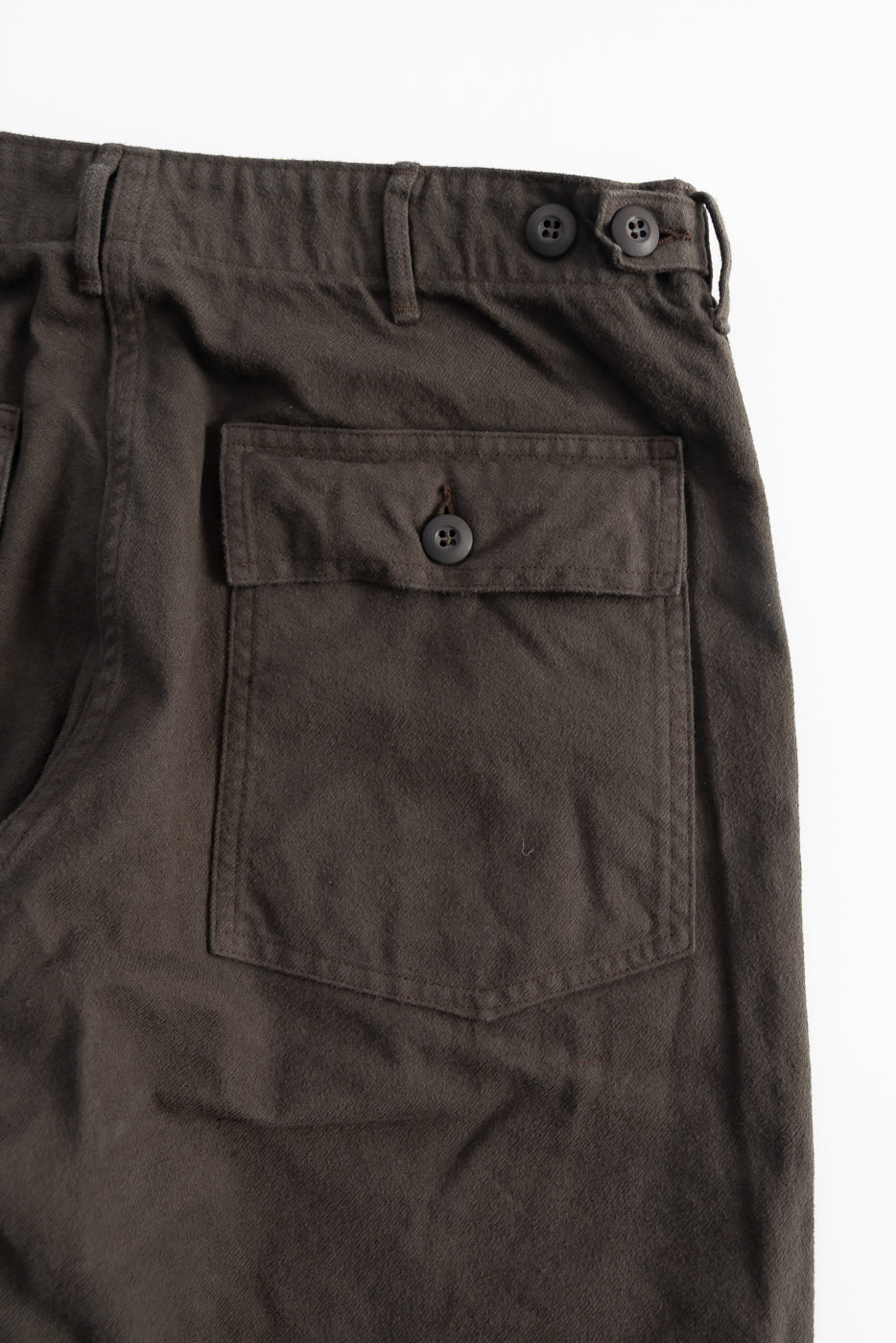 Close-up of orSlow coffee brown brushed flannel fatigue pants, back side pocket and buttons, Dant