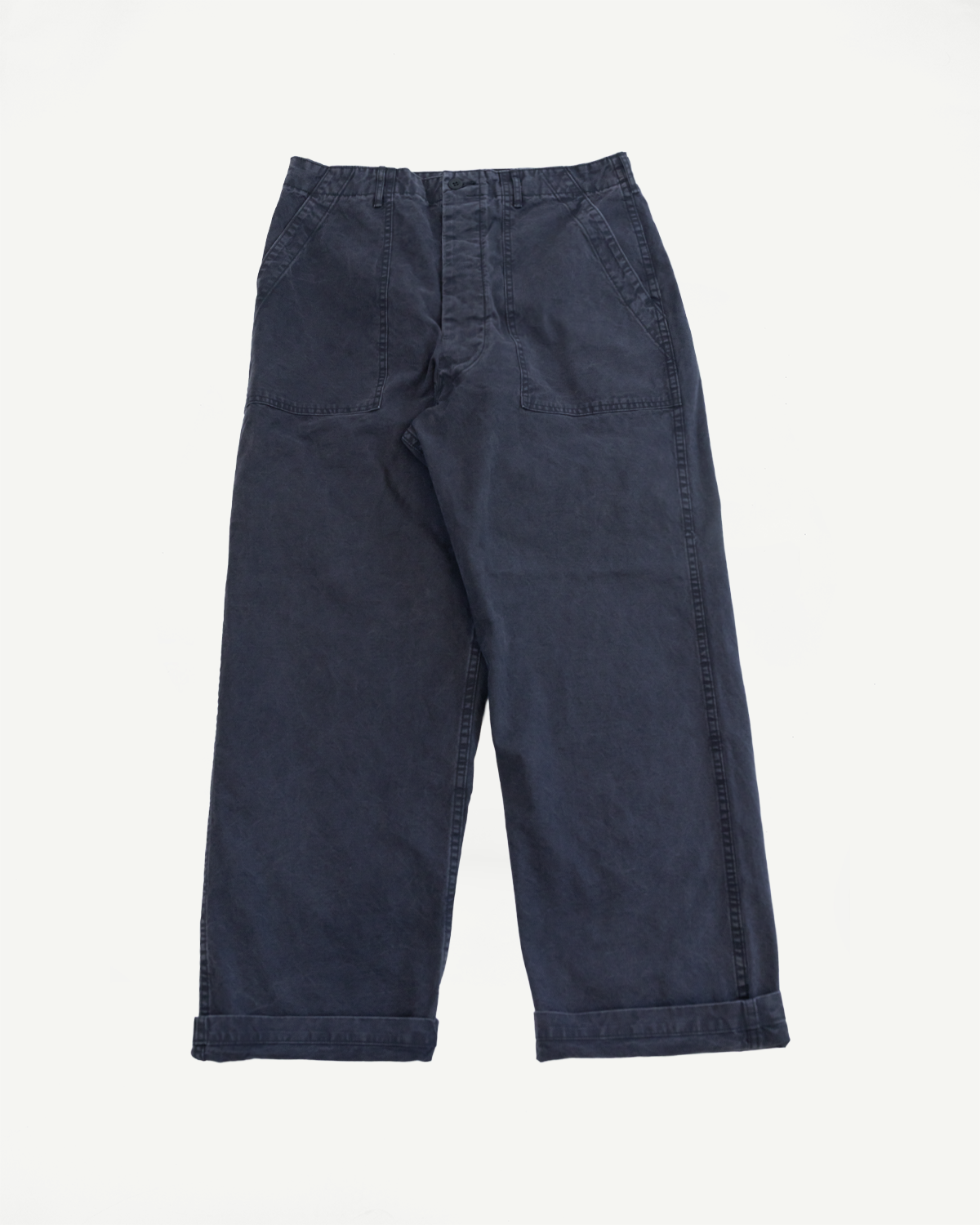 01-5103-M61K Duck Canvas Summer Fatigue Pants feature large front patch pockets, belt loops, button-and-zip fly, and turned-up cuffs, showcasing orSlow's high-rise, wide-fit silhouette for a relaxed summer style.