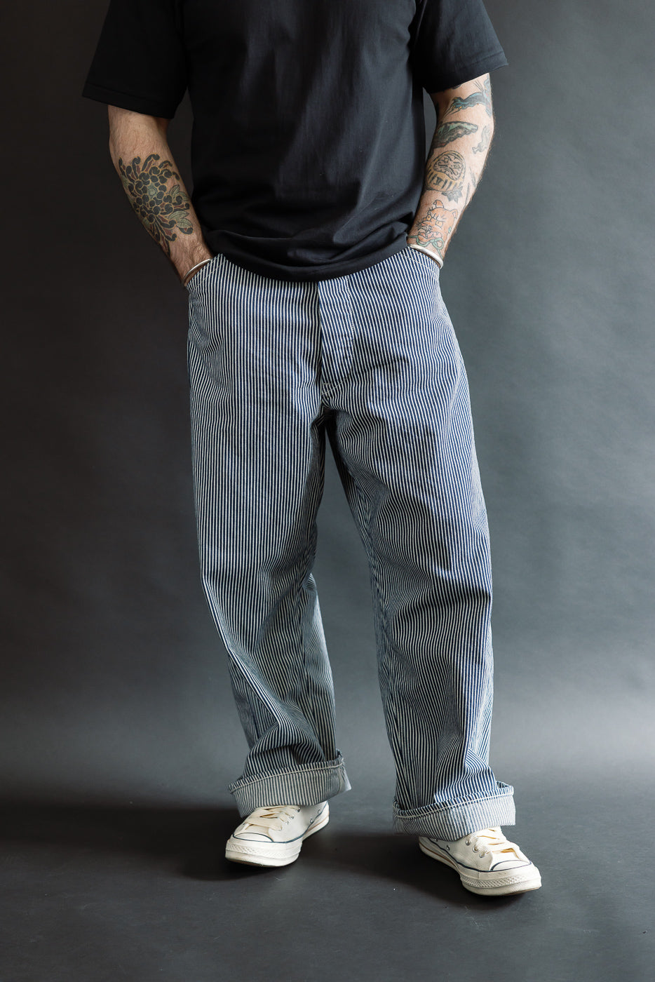 Full body front view of male model 5'9