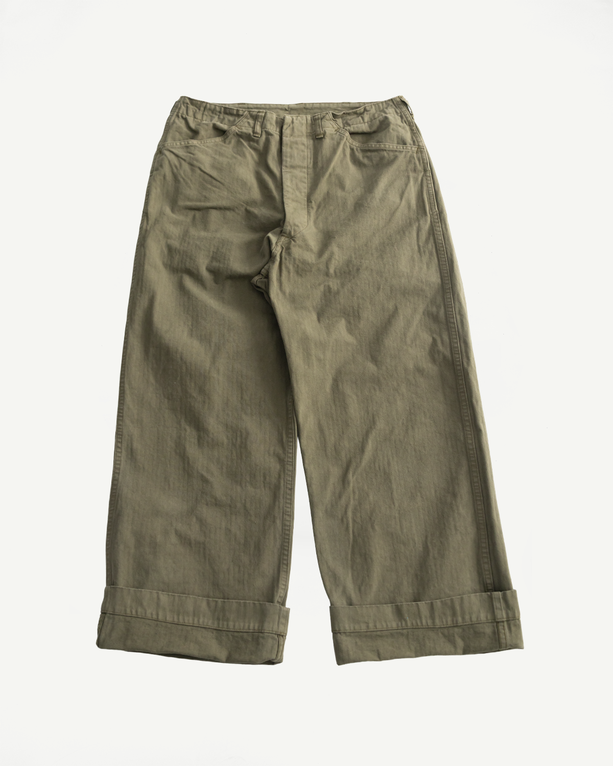Flat lay front view of orSlow USMC herringbone wide fit utility trousers in dark olive, Dant