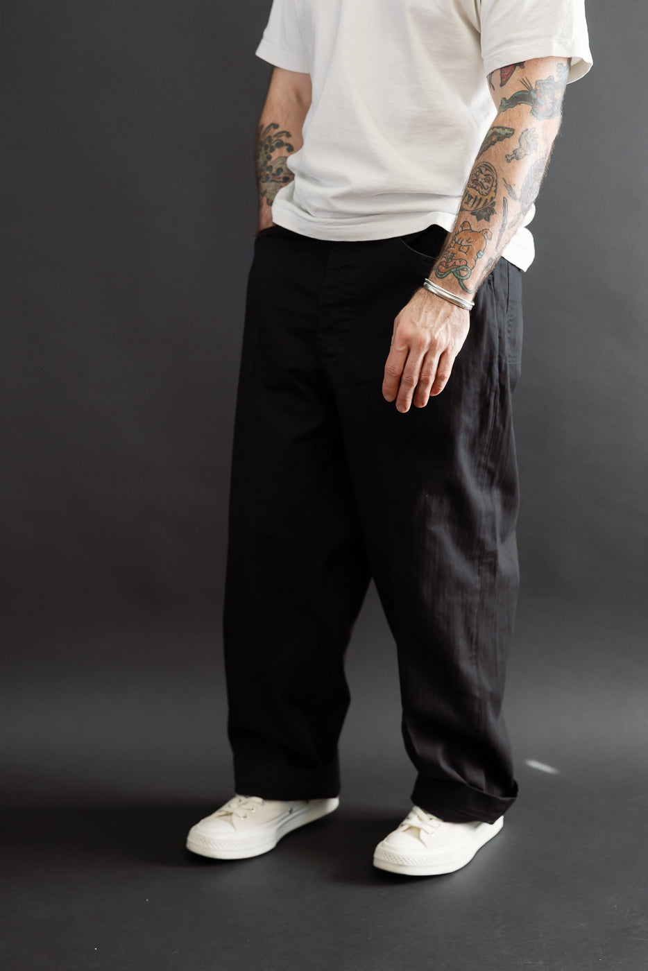 Full body front view of a male model, 5'9