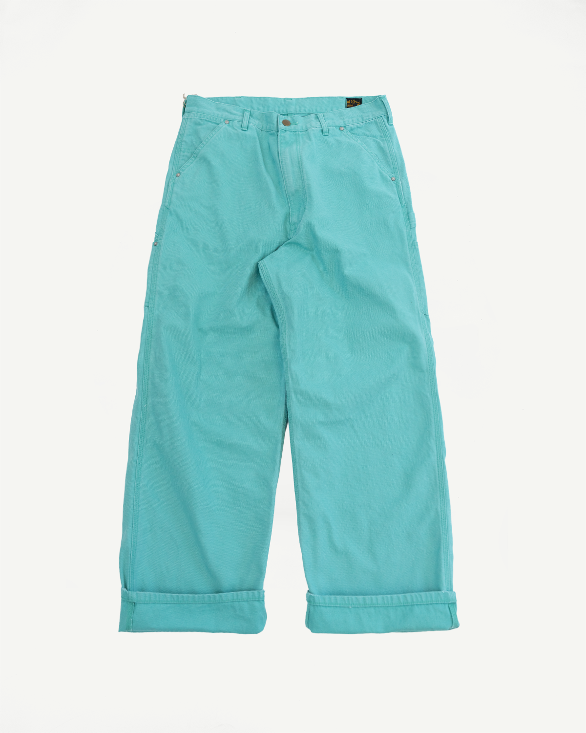 01-5328-39SK - Dad's Fit Painter's Pants Canvas - Turquoise: Loose-cut teal cotton pants with belt loops, front pockets, brass riveted details, and turned-up cuffs, showcasing a worn-in canvas texture.