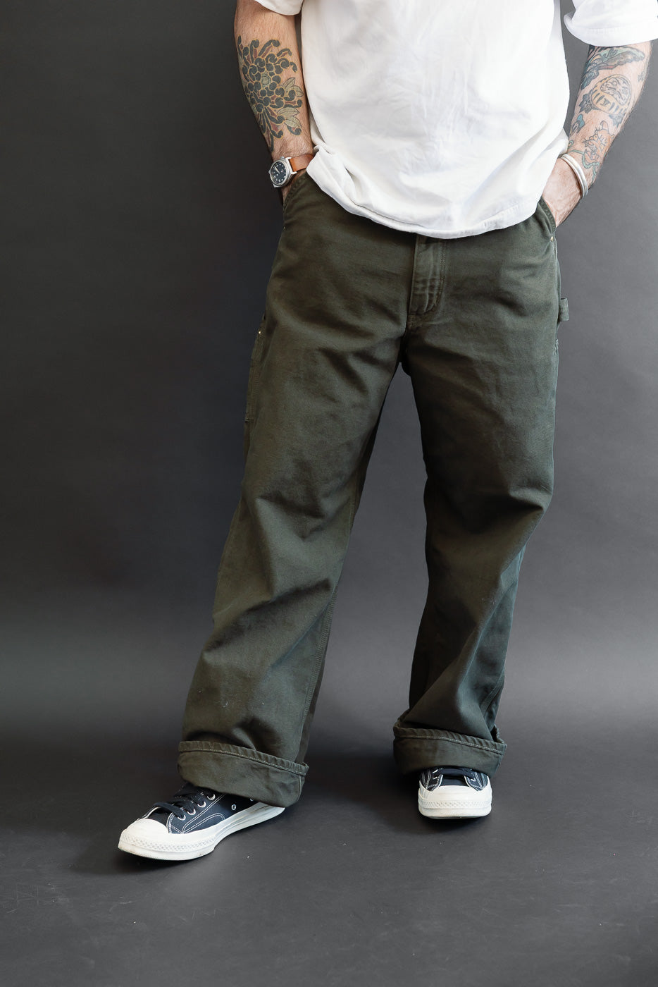 Full body front view of a male model, 5'9