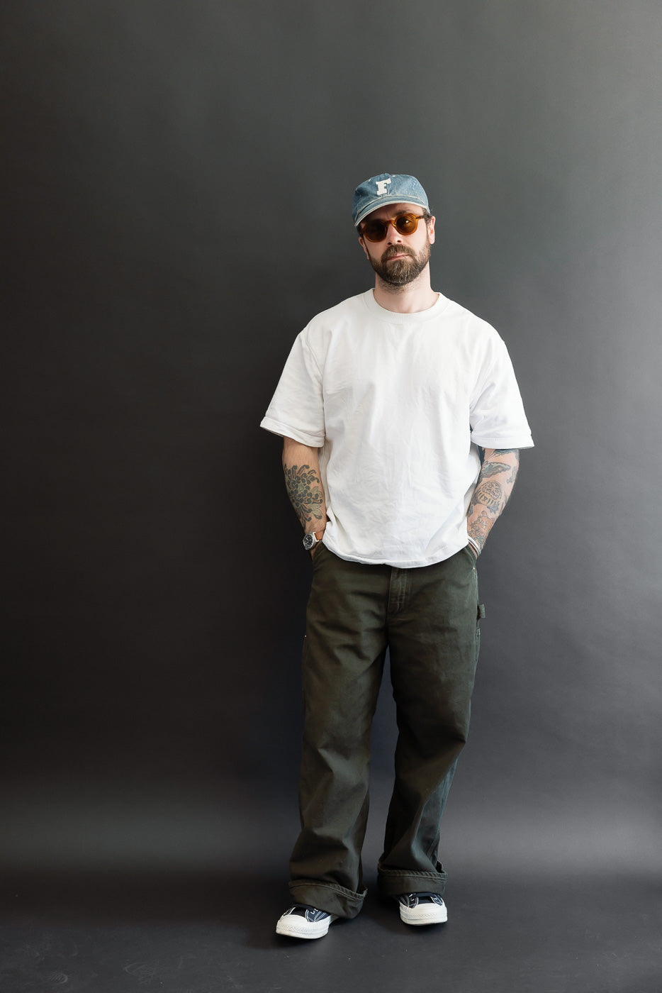 Full body front view of a male model, 5'9