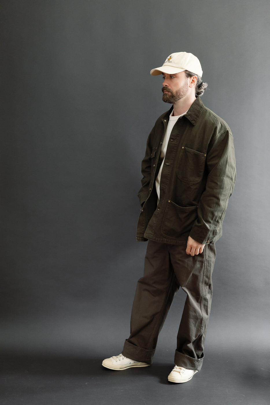Full body front view of a male model, 5'9