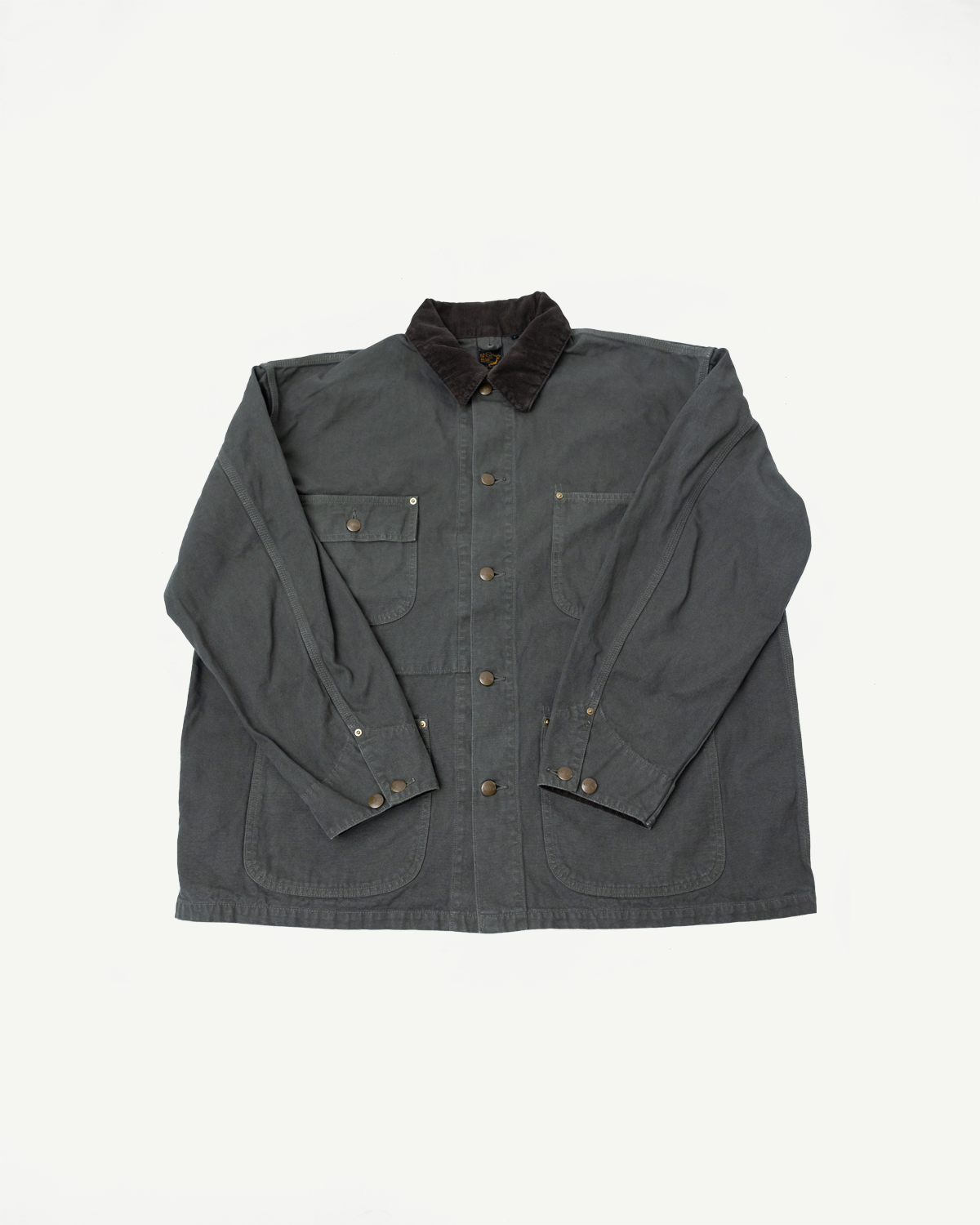 Flat lay front view of orSlow relaxed fit coverall jacket in army green with button details, corduroy collar, and chest pockets, Dant contemporary casual apparel.