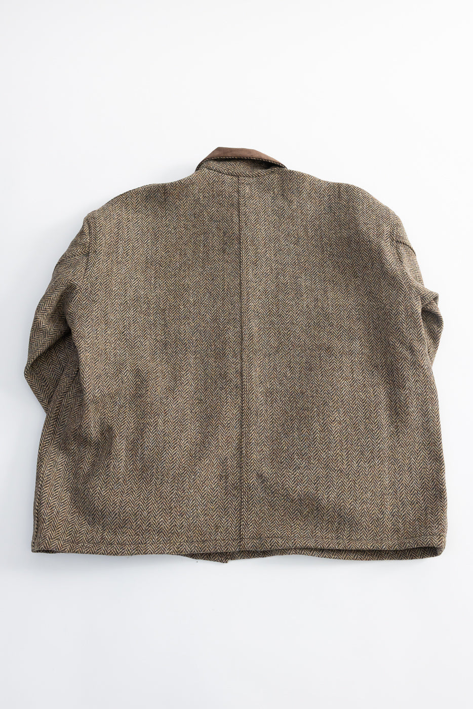 Flat lay of orslow Harris Tweed relaxed fit coverall jacket in khaki, back side shown, herringbone fabric, Dant Indianapolis