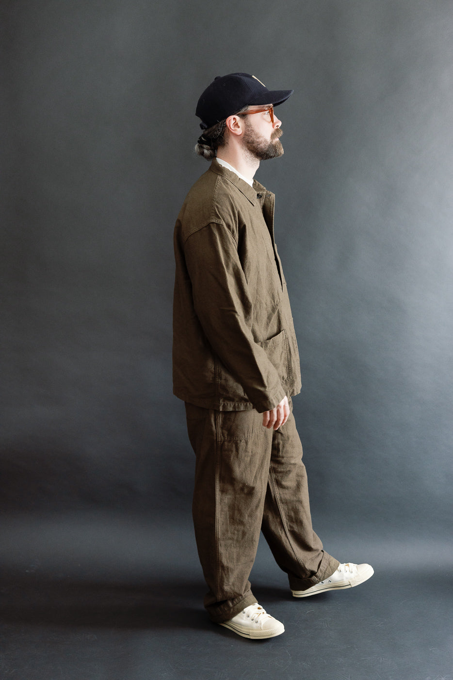 Full body side view of male model 5'9