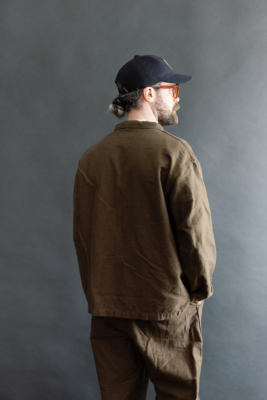 Back view of male model 5'9