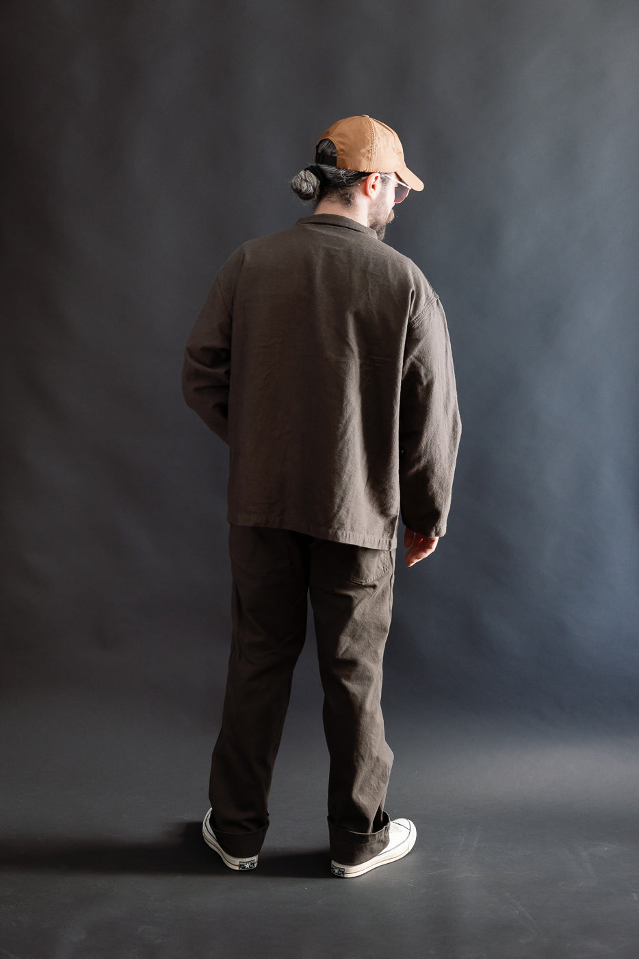 Back view, full body of male model 5'9