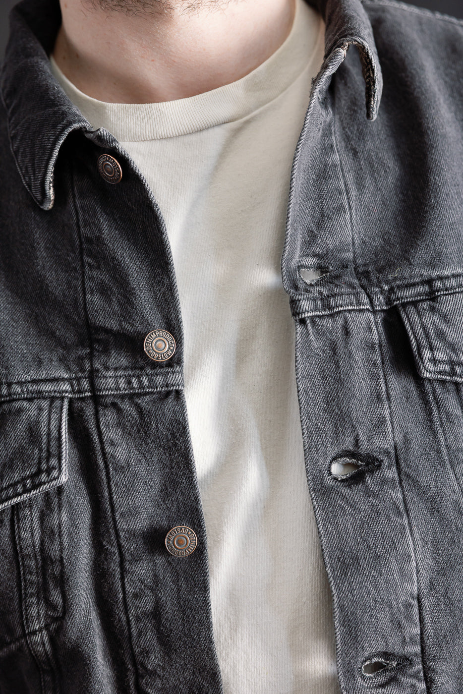 Close-up front view of orSlow black denim Type 3 jacket on male model, showing collar, button and chest details, model is 5'9