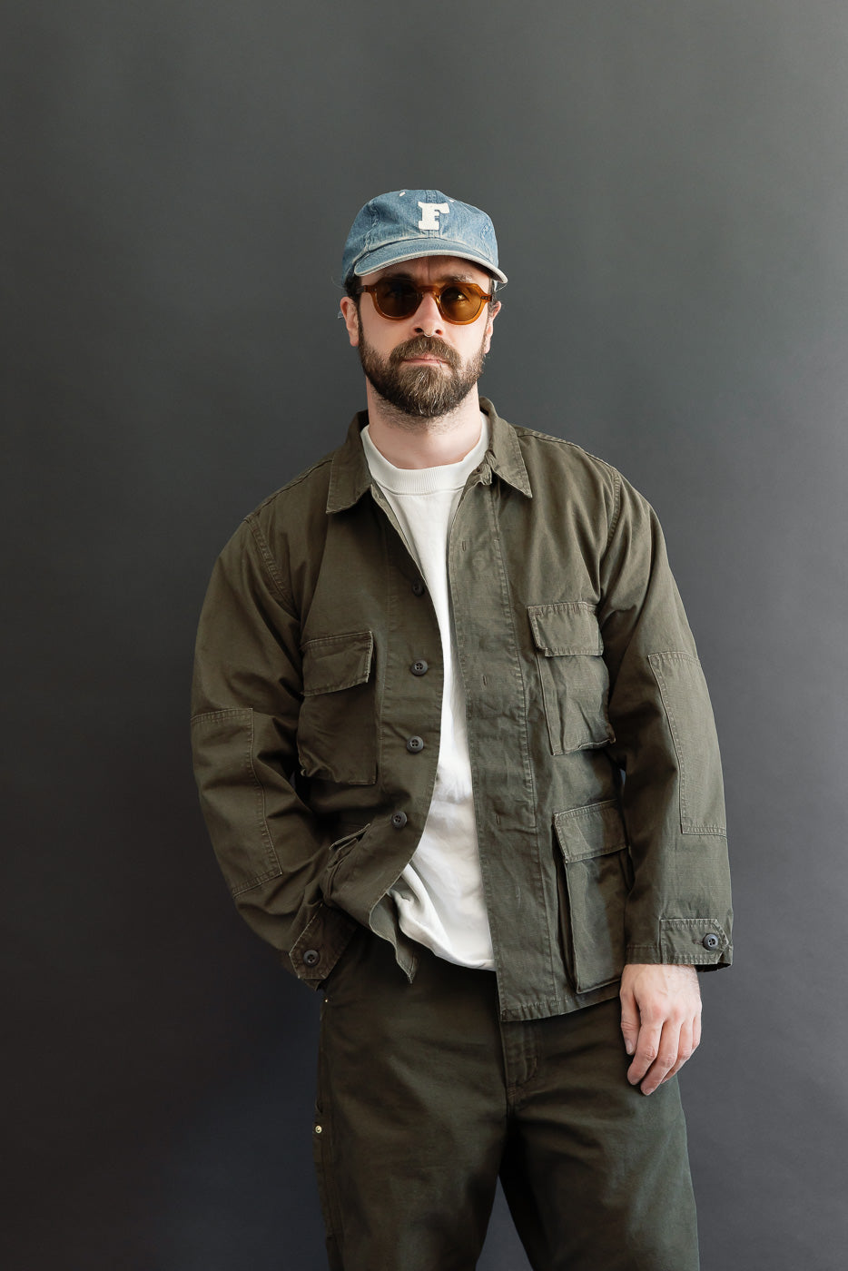 Full body front view of a male model, 5'9