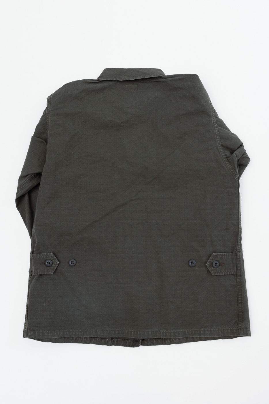 Back view flat lay of a dark olive green jacket with adjustable waist tabs and buttons.