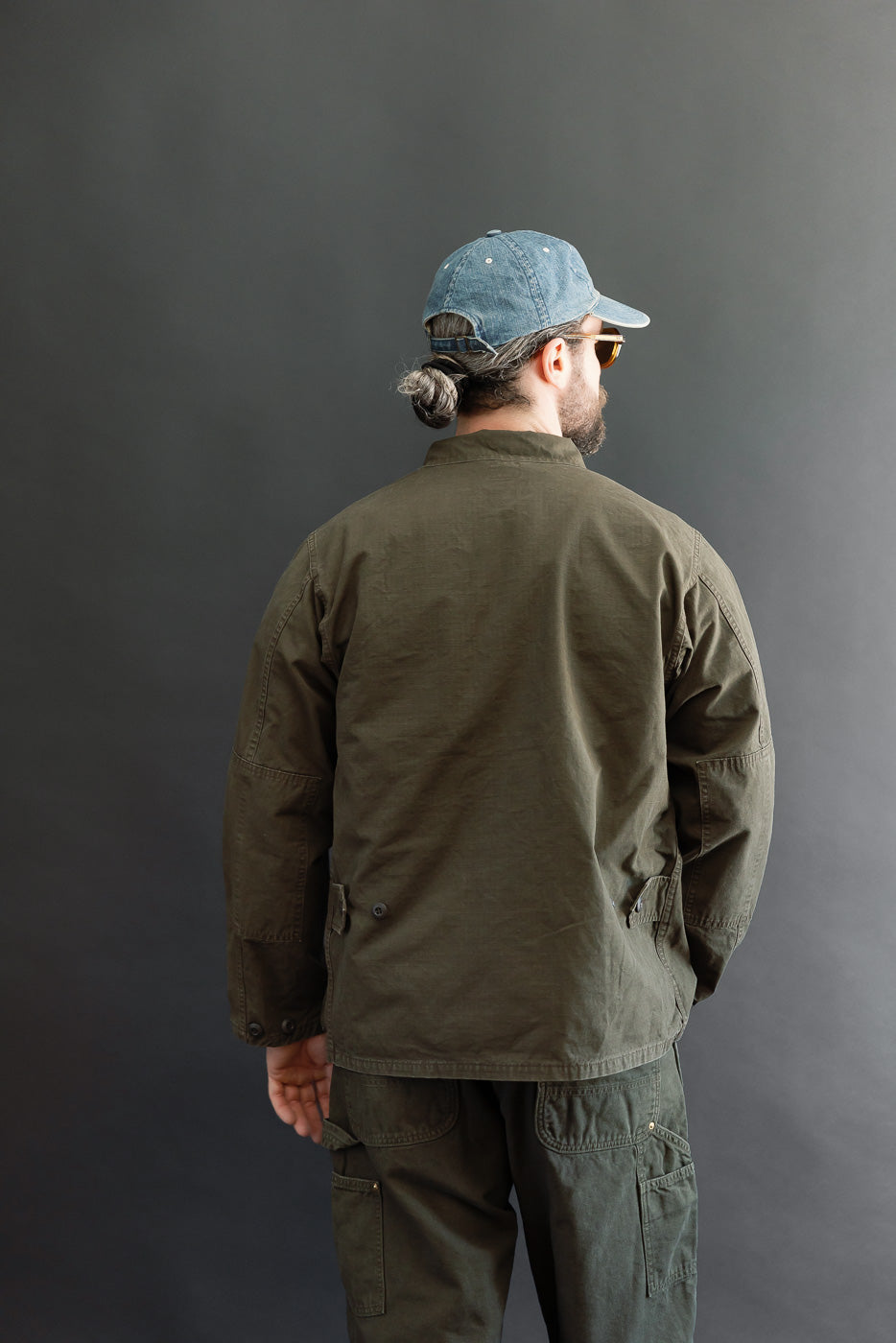 Back view, full body: athletic male model (5'9
