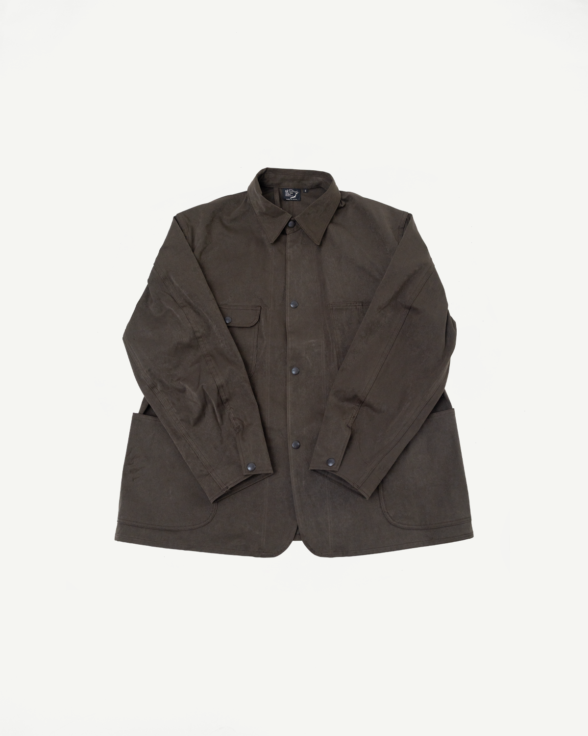 Front view flat lay of a dark brown button-up utility jacket with chest pockets.