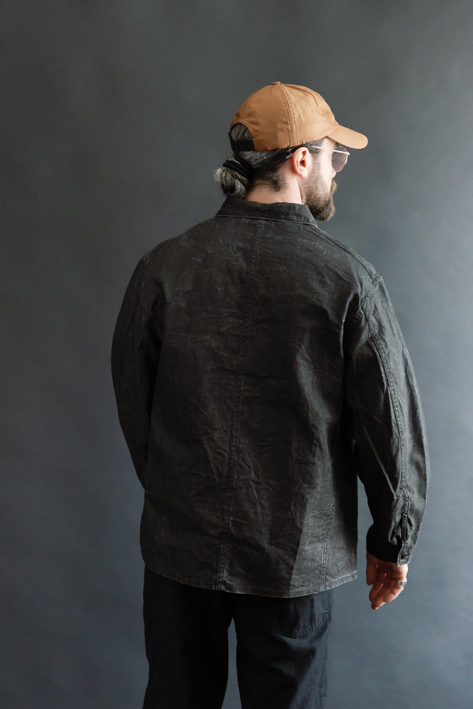 Full body rear view of male model 5'9