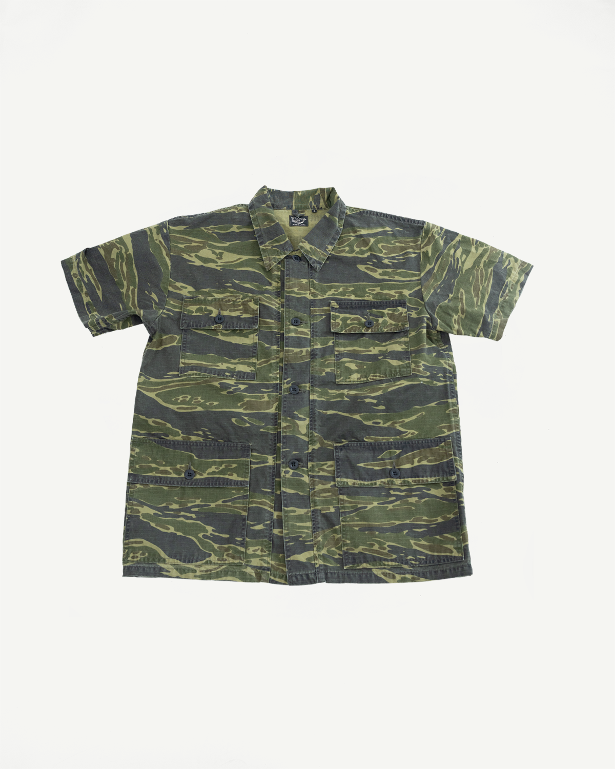 orSlow A01-8046 Utility Short Sleeve Work Shirt Jacket in Tiger Camo, featuring a relaxed fit with a shirt-jacket silhouette, button-front, pointed collar, and four flap-front utility pockets.