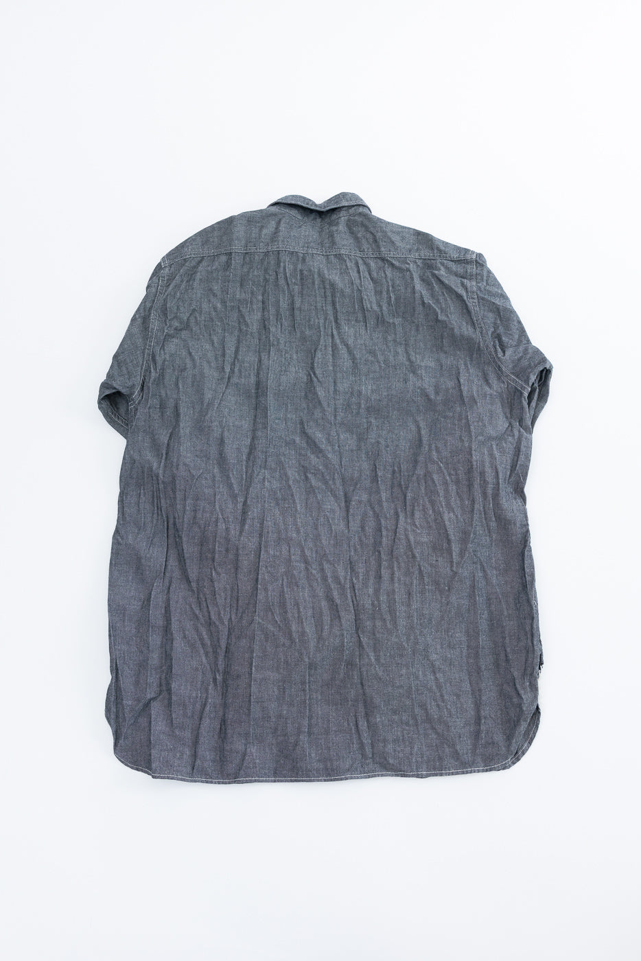 01-8270-61 - Relaxed Fit Chambray Work Shirt - Black, shown from the back, features short sleeves, double chest pockets, tonal buttons, and durable triple-stitched seams, embodying 1940s workwear style with a modern twist.