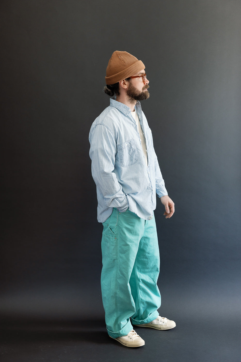 Full body side view of male model 5'9